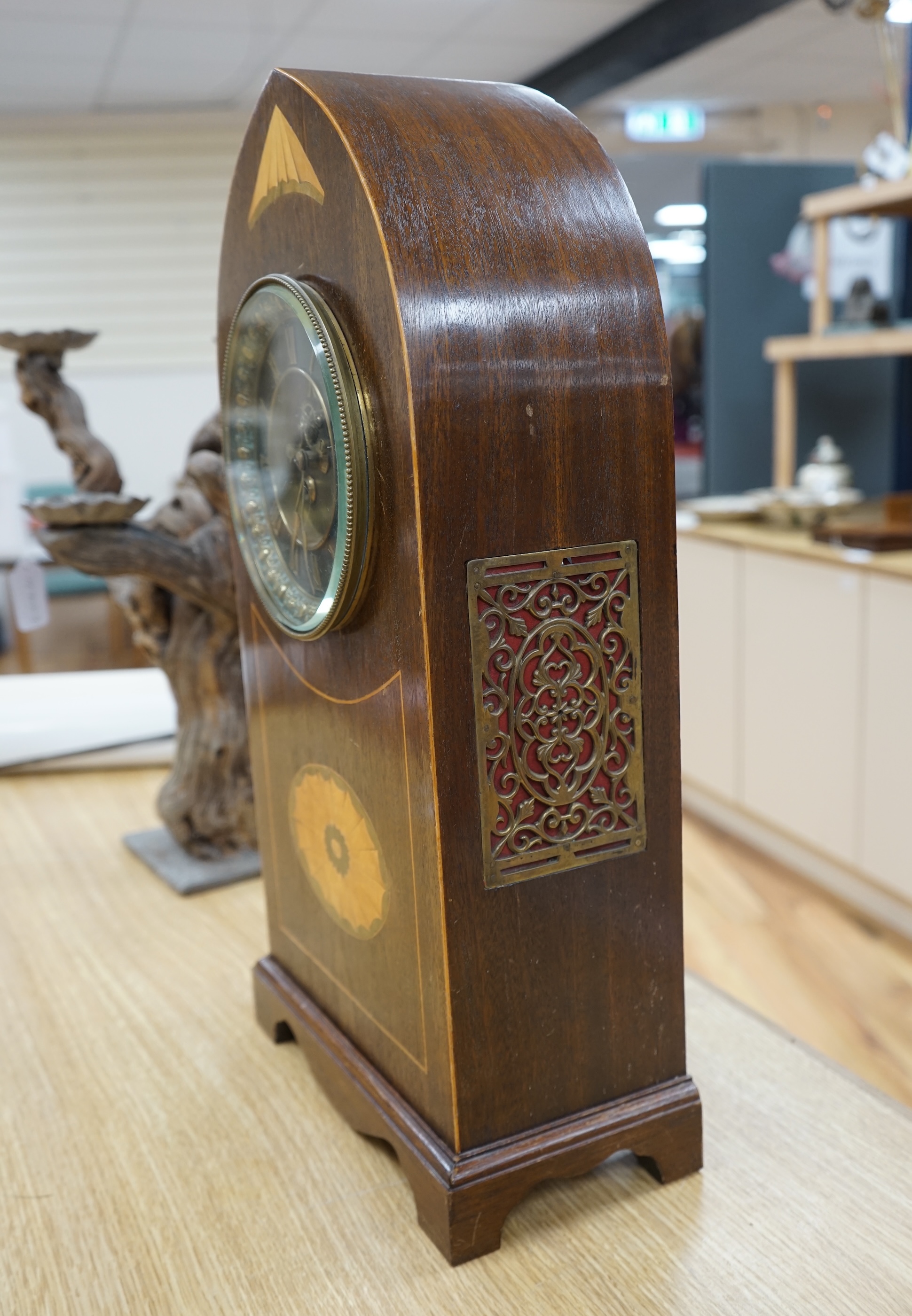 A late 19th century shell inlaid mahogany eight day lancet topped bracket clock, 56cm high. Condition - case good, clock lacking pendulum, untested if working.